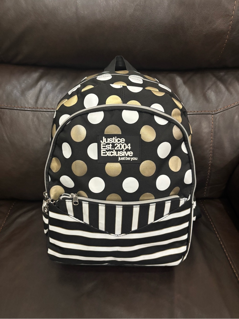 Justice Black Backpack with White and Gold Polka Dots & Stripes